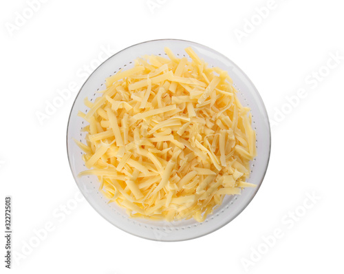 Glass bowl with grated cheese isolated on white, top view