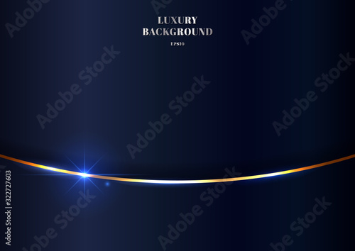 Abstract elegant gold curve line shiny on dark blue background with lighting effect luxury style.