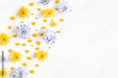 Flowers composition. Frame made of chrysanthemum flowers on white background. Flat lay, top view