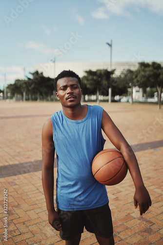 Portrait of a african american basketball player looking at camera