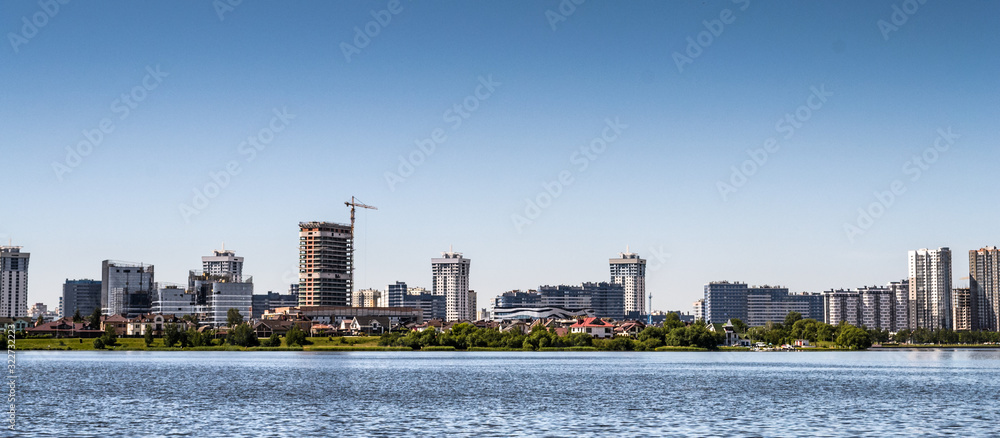 Panoramic city view from the lake