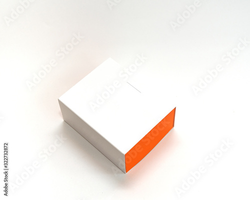 white box with orange side on a white background