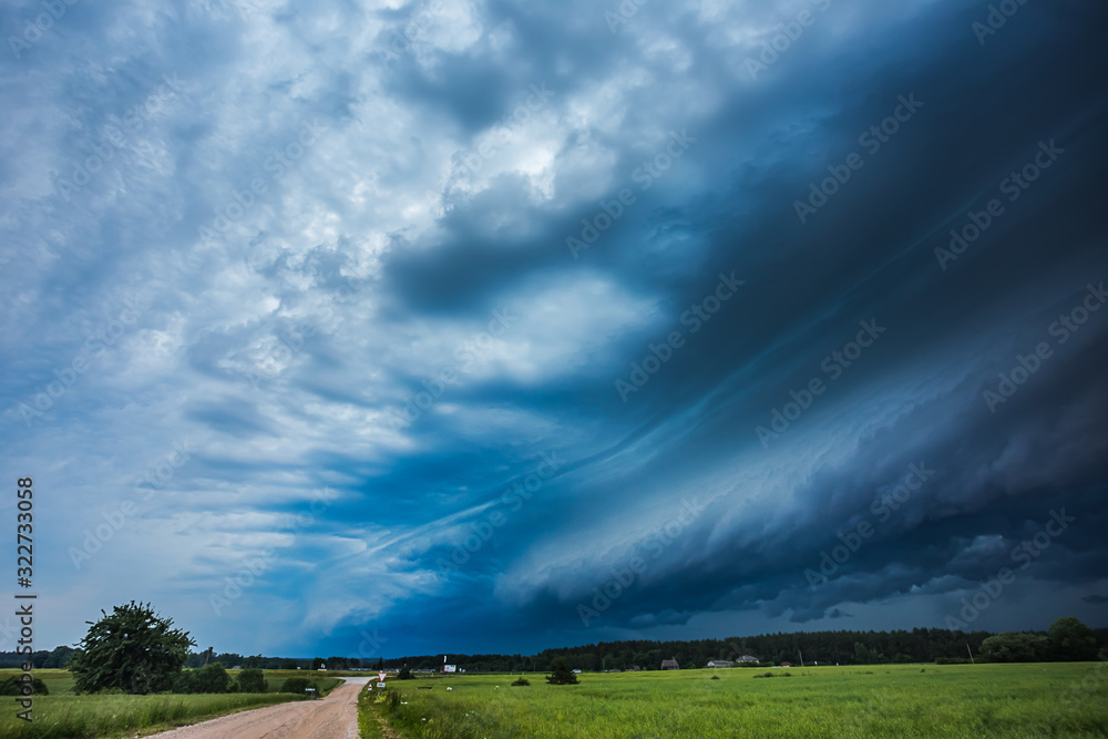 Storm clouds with shelf cloud and intense rain Storm clouds with shelf cloud and intense rain