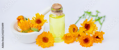 The calendula extract. Medicinal plants. Selective focus. photo