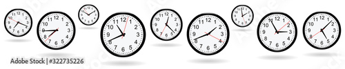 Clocks at different times on white background 
