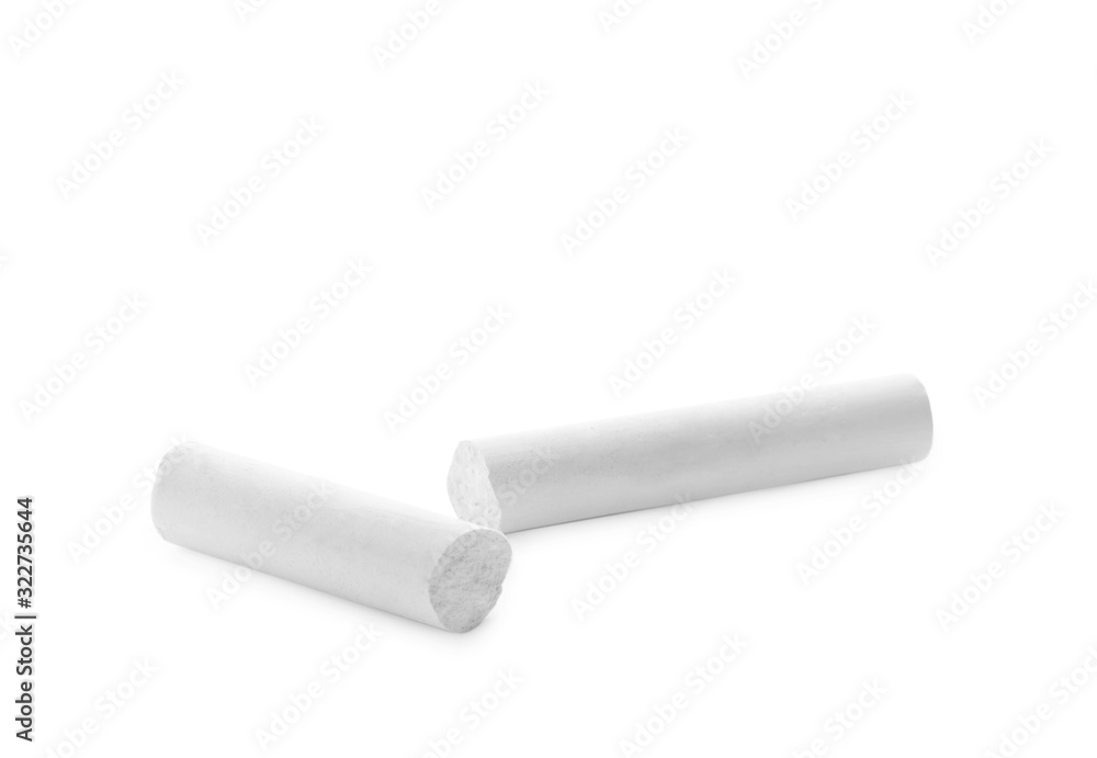 Small pieces of chalk on white background Small pieces of chalk on white background
