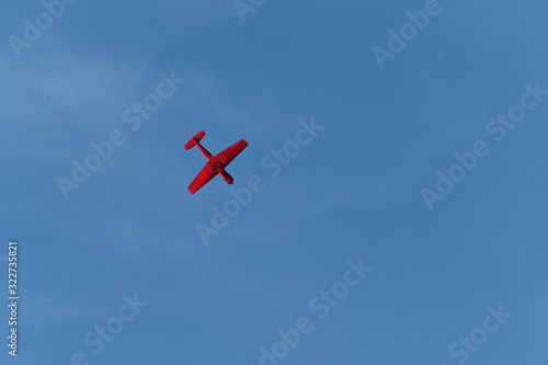 Red Aerobatic planes flying in the air