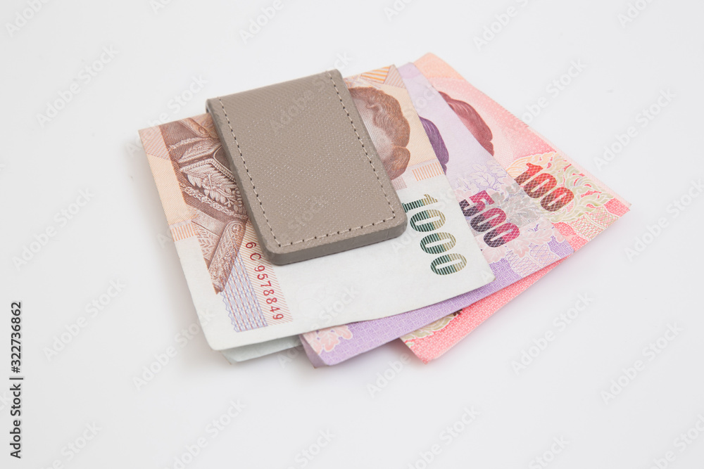 A leather money clip on the white background A leather money clip on the white background