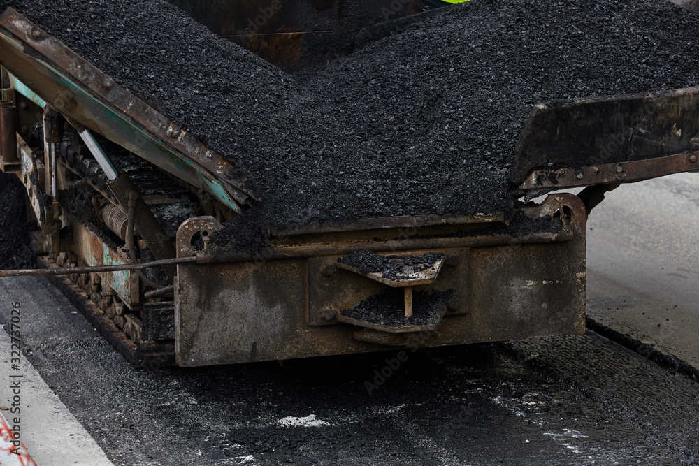 Fototapeta premium Industrial heavy machine working on road construction.