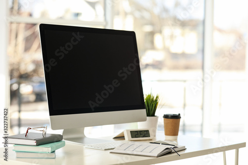 Wallpaper Mural Computer, notebooks and coffee on table in office Torontodigital.ca