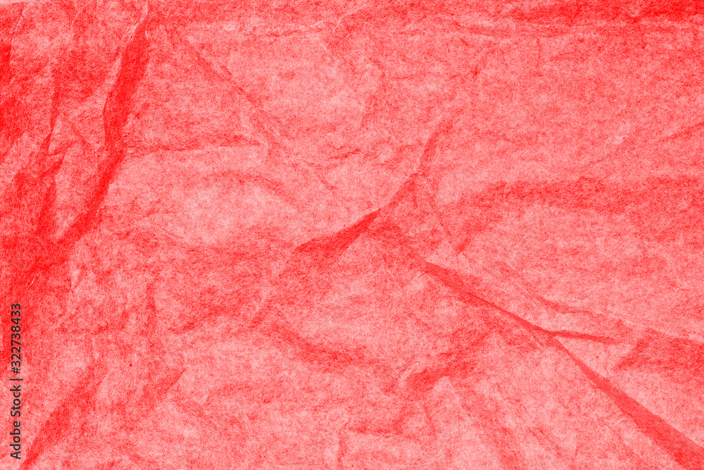 Decorative red crumpled paper. Abstract background. Space for lettering or design. Decorative red crumpled paper. Abstract background. Space for lettering or design.
