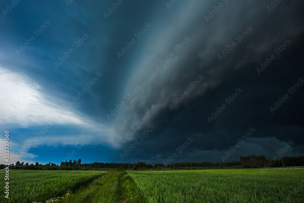 Storm clouds with shelf cloud and intense rain Storm clouds with shelf cloud and intense rain