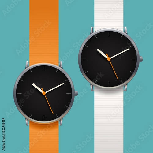 couple modern classic watches on blue background