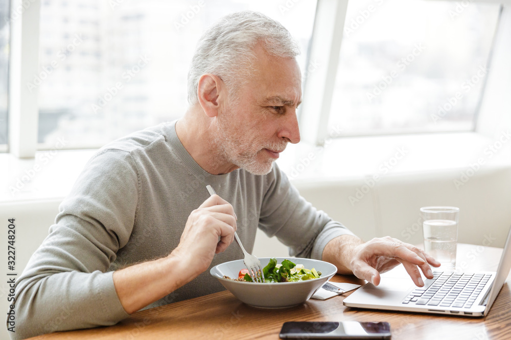Senior grey-haired bearded businessman Senior grey-haired bearded businessman