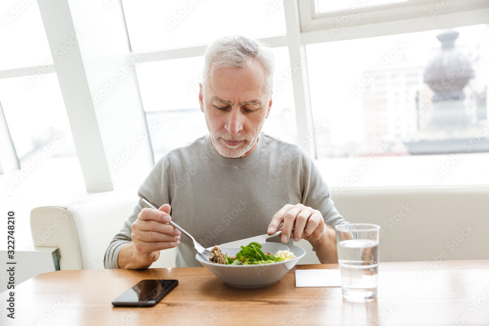 Senior grey-haired bearded businessman Senior grey-haired bearded businessman