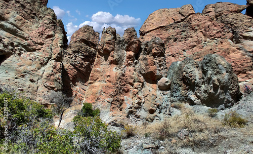 The amazing badlands and palisades of the John Day Fossil Beds clarno unit and rock formations in a semi desert landscape in Oregon State photo