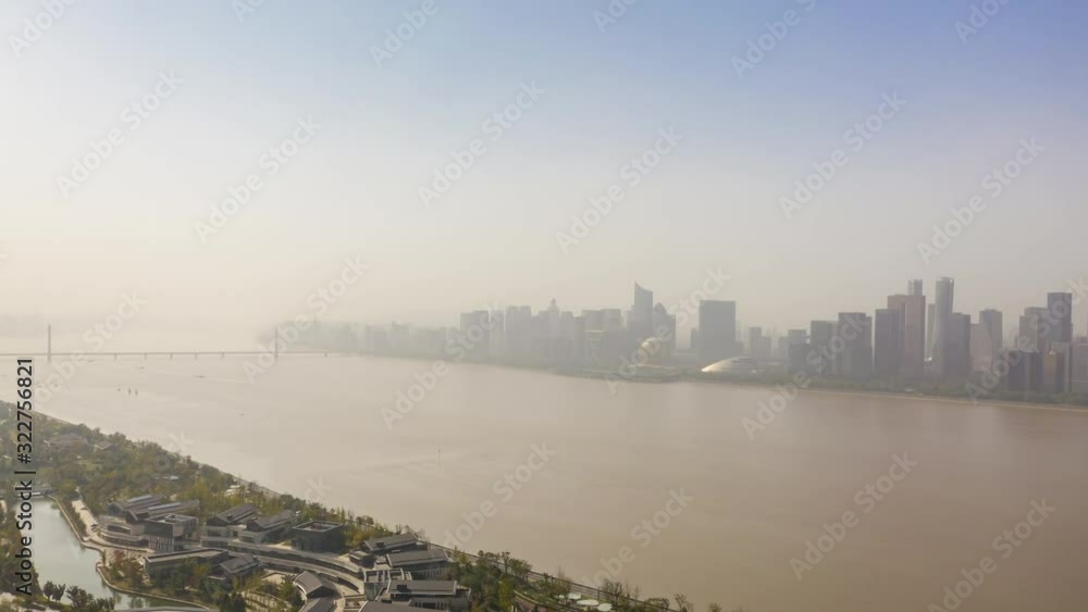 sunny day hangzhou city downtown view riverside traffic park complex bay aerial timelapse panorama 4k china sunny day hangzhou city downtown view riverside traffic park complex bay aerial timelapse panorama 4k china