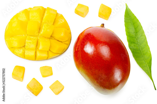 mango with slices and green leaves isolated on white background. healthy food. top view