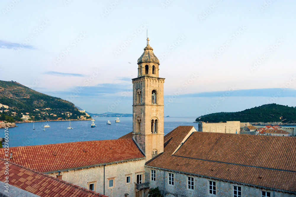 Old church bell tower and Adriatic Sea Dubrovnik evening