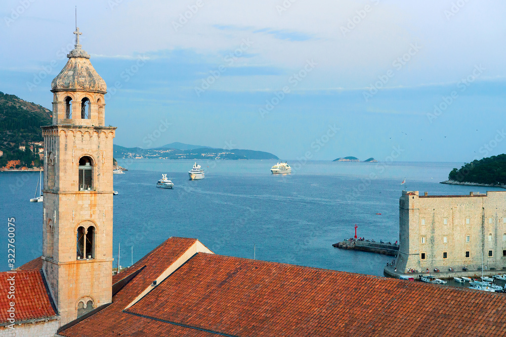 Old church bell tower and Adriatic Sea Dubrovnik in evening