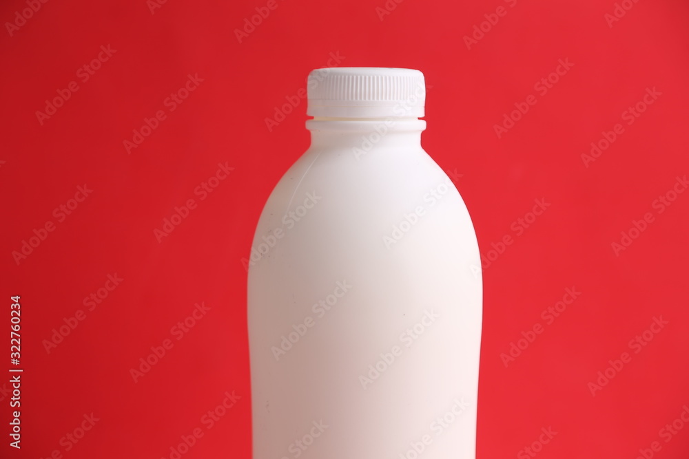 liquid yogurt bottle in color background liquid yogurt bottle in color background