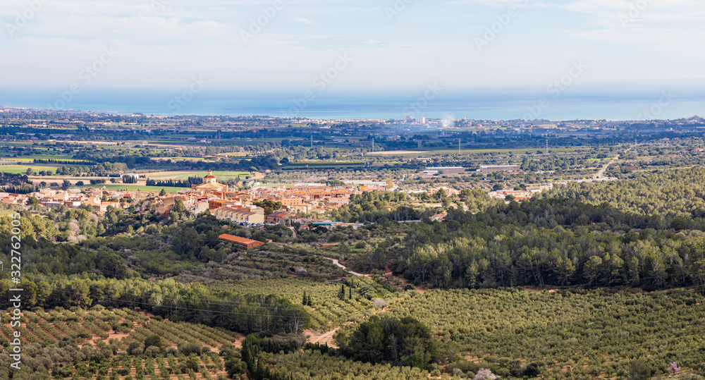 Fototapeta premium Panoramic view of Mont-roig and the Costa Dorada seen from the Sanctuary of La Mare de Deu of Roca, Catalonia, Spain