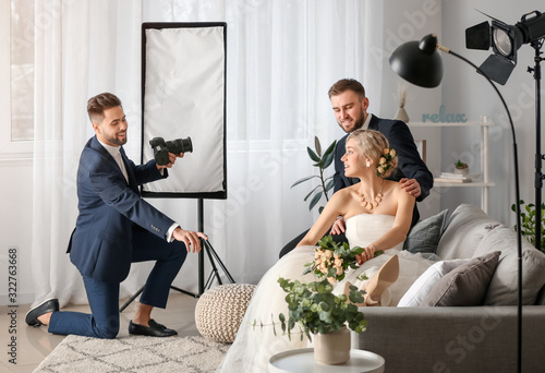 Photographer working with y...