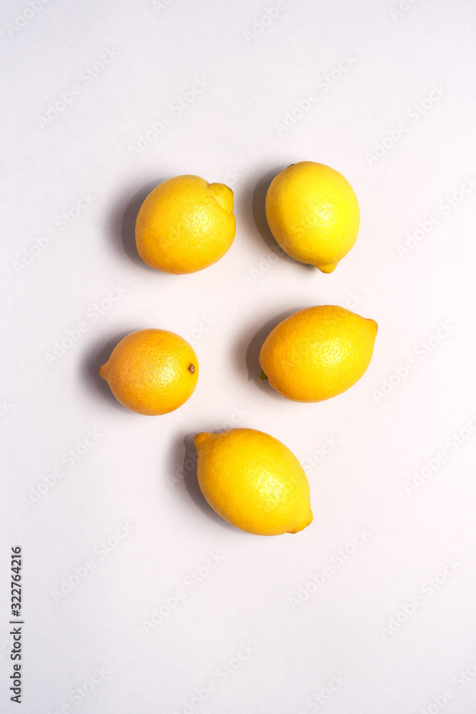 Overhead View Of Fresh Lemons Against White Background Overhead View Of Fresh Lemons Against White Background