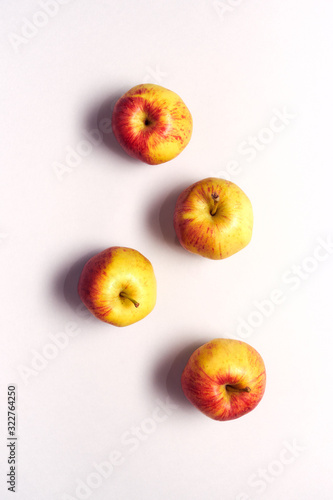 Overhead View Of Fresh Apples Against White Background