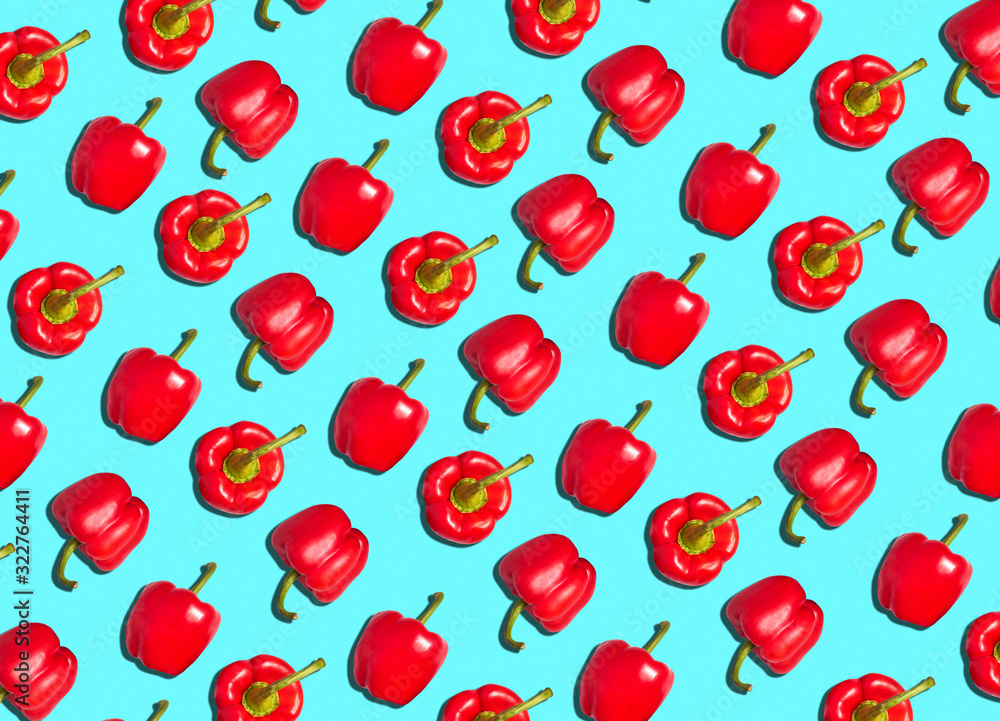 Graphic Background Pattern Of Red Peppers Against Blue Background Graphic Background Pattern Of Red Peppers Against Blue Background