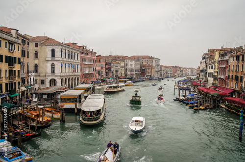 Grand channel with boats in Venice, Italy, Europe.