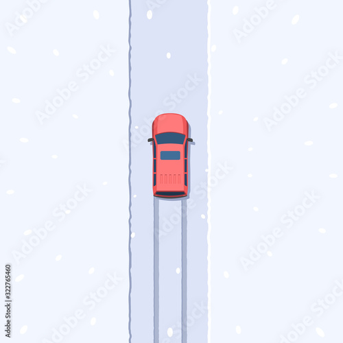SUV on snowy road top view