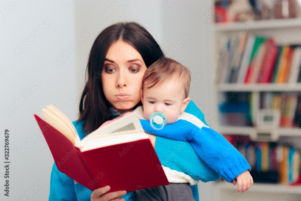 Fototapeta premium Funny Mother Reading Fairytale Book To her Baby