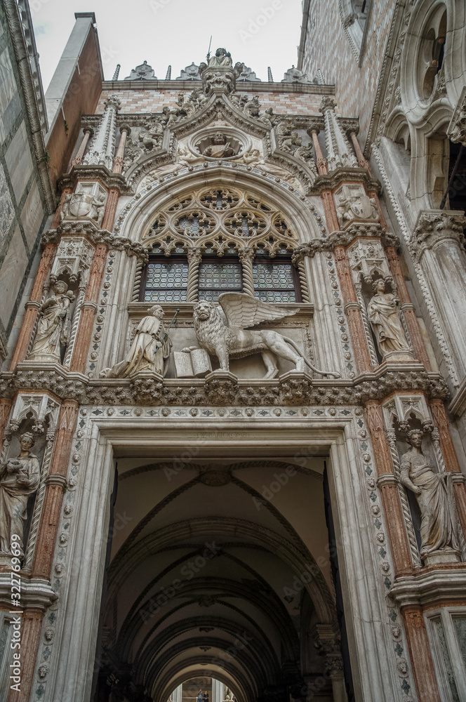 Door and Sculpture in piazza San Marco, Venice, Europe