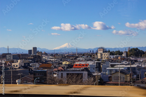 Japanese suburbs and Fuji mountain on a bright winter day