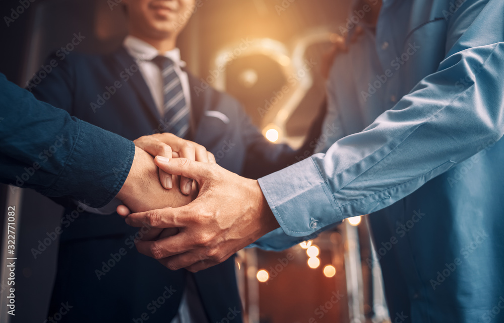 © Charnchai saeheng - Business shaking hands, finishing up meeting. Successful businessmen handshaking after good deal. © Charnchai saeheng - Business shaking hands, finishing up meeting. Successful businessmen handshaking after good deal.