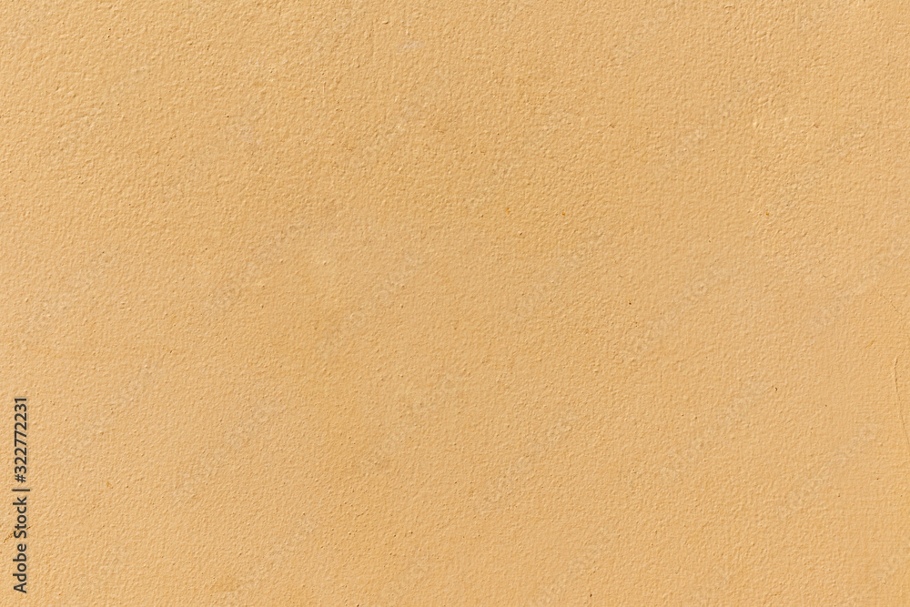 Details of the yellow concrete wall texture for background. Details of the yellow concrete wall texture for background.