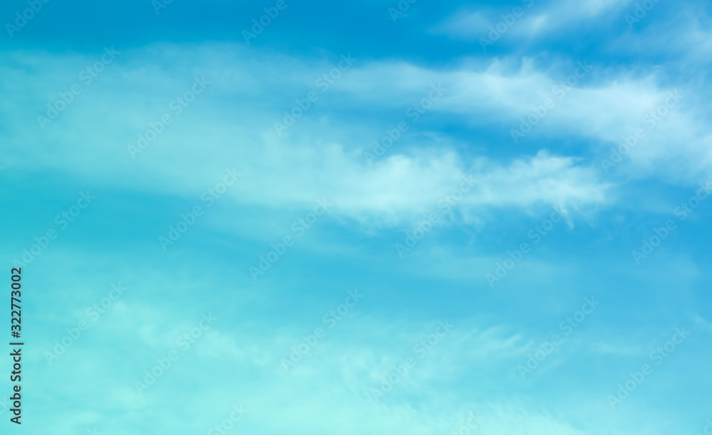 ิblue sky against white floating clouds background ิblue sky against white floating clouds background