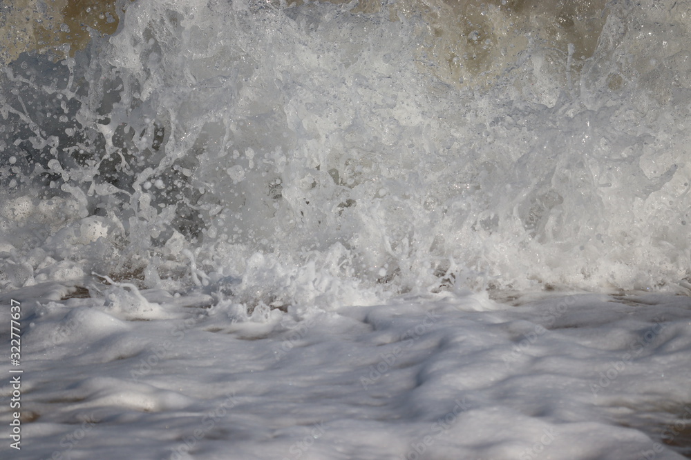 close up of water wave on beach, wave concept for nature power