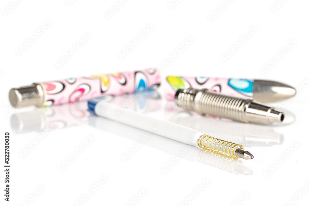 Obraz premium Group of four pieces of writing ballpoint pen isolated on white background
