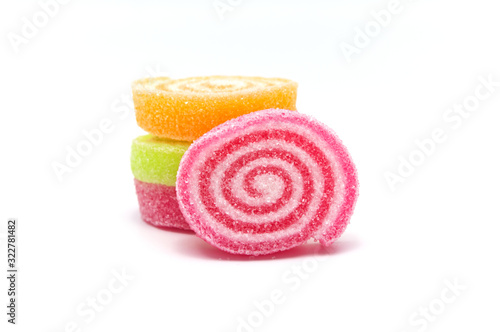Assorted various bright candies colorful  gelatin jelly sweets, gummy sugary tasty. Soft gums viewed from above. Isolated on white background.