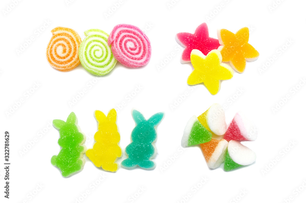 Assorted various bright candies colorful  gelatin jelly sweets, gummy sugary tasty. Soft gums viewed from above. Isolated on white background.