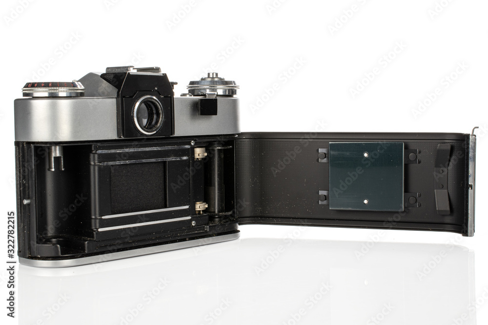 One whole silver vintage camera isolated on white background
