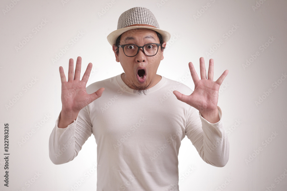 Asian Man Shocked with Mouth Open Asian Man Shocked with Mouth Open