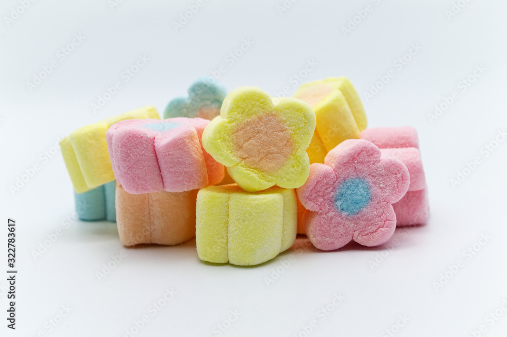 Pastel sweet flowers shape of marshmallows on white background. Pastel sweet flowers shape of marshmallows on white background.