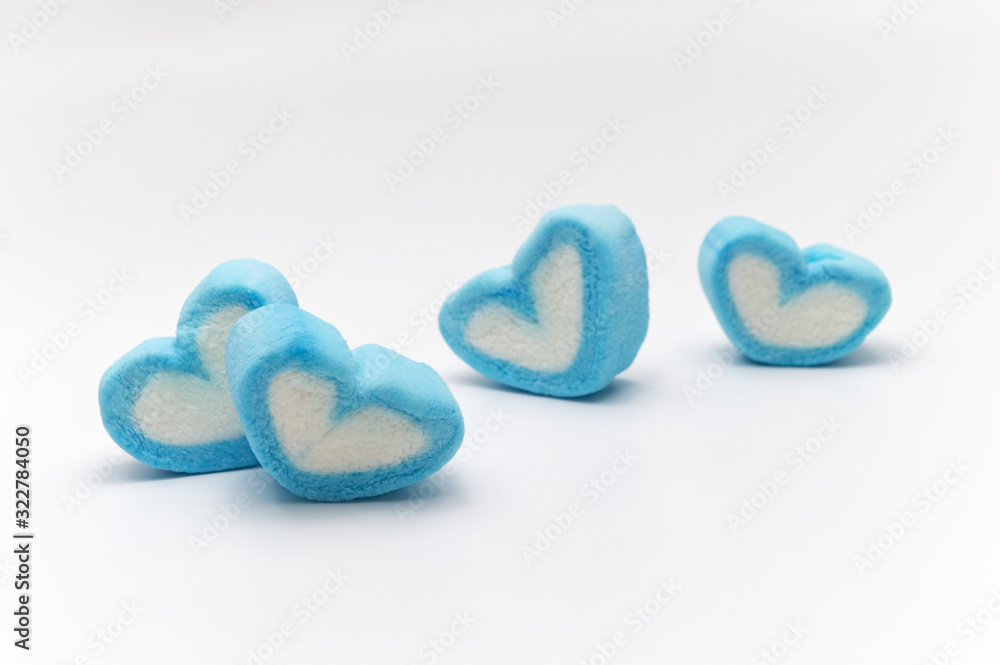 Blue sweet heart shape marshmallow on white background. Blue sweet heart shape marshmallow on white background.