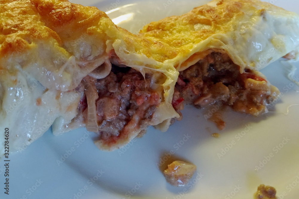 Crispy Enchilada with juicy spicy filling. Crispy Enchilada with juicy spicy filling.