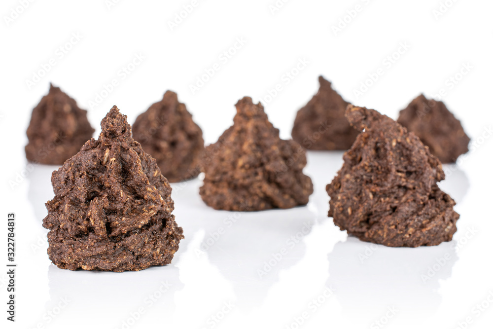 Group of seven whole homemade brown coconut cocoa biscuit isolated on white background Group of seven whole homemade brown coconut cocoa biscuit isolated on white background