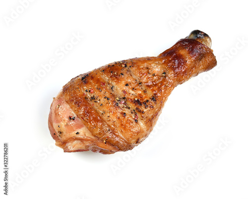 Grilled roasted bbq chicken leg isolated on white background
