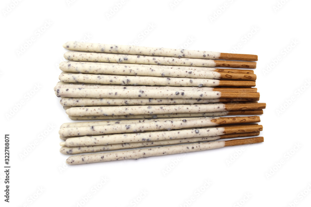 Chocolate biscuit stick coated with milk flavour confectionery and crushed cookies and cream taste isolated on white background. Chocolate biscuit stick coated with milk flavour confectionery and crushed cookies and cream taste isolated on white background.